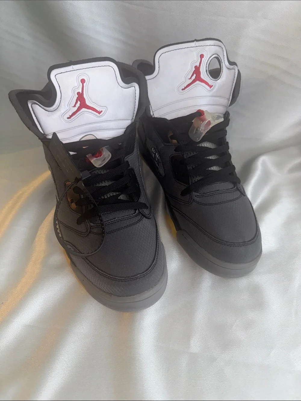 New! Off-White x Air Jordan 5 Retro SP 'Muslin' features a faded black textile